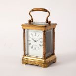 A small gilt brass and engraved carriage clock, Elliott & Son, London,