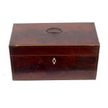 An early 19th Century mahogany tea caddy, 30.