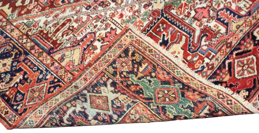 A Persian Heriz carpet, early 20th Century, of geometric design within a multiple border, - Image 3 of 3