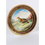 A Derby Crown cabinet plate painted a grey partridge, signed H Deakin,