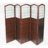A five-panel, four-fold screen with leaded glazed panel to the top,