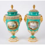 A pair of Copeland turquoise ground topographical pot pourri vases and covers, printed green marks,