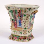 A Cantonese square-shaped, two-handled vase with flanged top, enamelled figures in reserves,