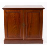 A mahogany cupboard enclosed by a pair of doors, 91.