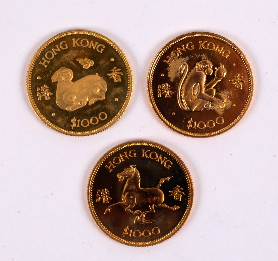 A Hong Kong $1000 gold coin for the Year of the Horse, 1978, another for the Year of the Ram,