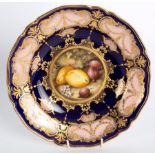 A Worcester fruit painted dish by Sebright,