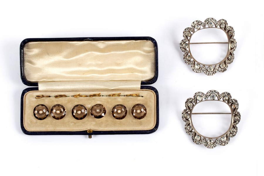 A pair of Victorian paste set shoe buckles converted to brooches,