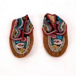 A pair of Native American beaded moccasins, Eastern Woodlands, probably Iroquois,