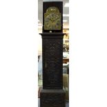 A late 18th Century longcase clock with brass arch dial, date recorder,