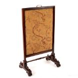 A mid 19th Century rosewood fire screen with adjustable needlework panel,