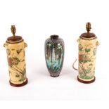 A cloisonné vase with reserves of birds in flowering branches,