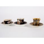 Three late 19th Century Continental porcelain blue ground cabinet cups and saucers,