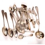 A quantity of silver flatware, various dates and makers, mostly bearing a crest, to include a ladle,