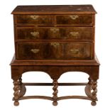 A William and Mary oyster veneer chest on stand, circa 1690,