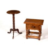 A circular mahogany table on a bobbin turned column and tripod support and a small oak table fitted