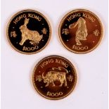 A Hong Kong $1000 gold coin for the Year of the Ox, 1985, another for the Year of the Tiger,
