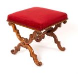 A Regency style mahogany dressing stool, on x-shaped supports united by a central stretcher, 44.