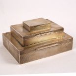 An Asprey & Co. silver cigar, cigarette and matchbox case, London 1928, of triple deck form, 16.