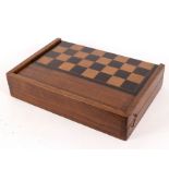 A late 19th Century games box inlaid for chess and backgammon,