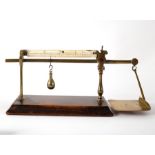 A set of 19th Century postal scales by Bloore, to weigh up to four ounces on a wooden base,