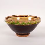 Clive Bowen (born 1943), a stoneware bowl, green wavy border, yellow interior, brown exterior,