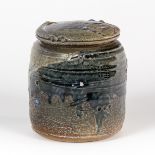 Don Reitz (1929-2014), a lidded stoneware jar, green saltglaze incised body, painted signature, 13.