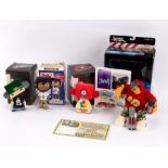 A Mezco Toyz 'Fat Cap' graffiti figure, boxed and two Wheaty Wheat Studios Mad toy figures,