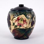 Moorcroft Pottery, a Hellebore jar and cover, design by Nicola Slaney 1999, 15.