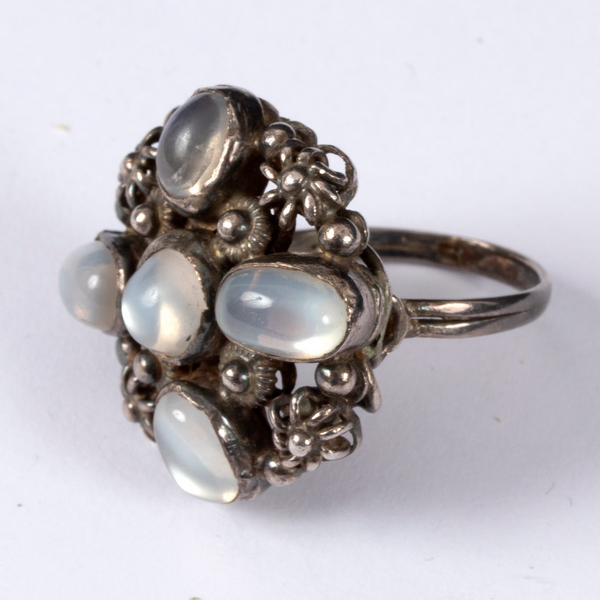 Style of George Jensen, a silver and moonstone ring, set with five cabochon stones, - Image 2 of 3