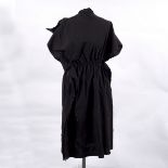 An Issey Miyake Haat black cotton dress with elasticated waist and textured fabric decoration,