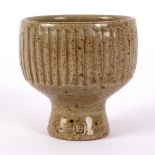 David Leach (1911-2005), a small fluted bowl with oatmeal speckled glaze, impressed mark, 7.