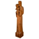 Style of Eric Gill, a life-sized adzed wood carving, Mother and Child, signed A Kent,