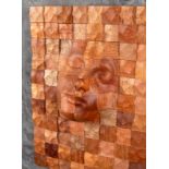 Eduart Gjopalaj (born 1978), The Dreamer, relief wood carving of a face, initialled, 35cm x 25.