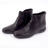 A pair of Prada black leather ankle boots, with side zip,