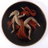 WMF, an Ikora Art Deco circular metal plaque, decorated a dancing nude, impressed mark to back,