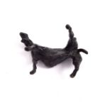 Manner of Elisabeth Frink, a bronze maquette of a dog, rolling on its side,