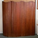 A French Art Deco pine tambour dressing screen, with Baumann labels,