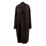An Issey Miyake wool crepe dress coat, half-lined with button front,