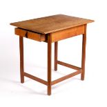 Gordon Russell, British 1920s, a cherrywood and mahogany table fitted a drawer to one end,