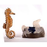 Ann Stokes (1922-2014), an earthenware figure of a seahorse, with mottled yellow,