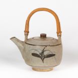 Lowerdown Pottery, a stoneware teapot, grey speckled glaze with foliate motifs in iron and blue, 12.