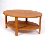 A Laura Ashley modern oak oval coffee table, with platform under, 100cm wide x 70.75cm deep x 48.