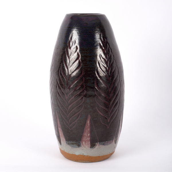 A Studio Pottery conical vase with incised leaf decoration, 21cm high,