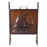 An Arts & Crafts Newlyn style copper firescreen,