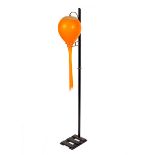 Stilnovo, Italian 1960s, a floor lamp, the sculptural orange glass shade supported by a metal frame,