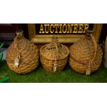 3 LARGE SPIRIT BOTTLES WITH BASKETS