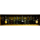 COLLECTION OF 12 OLD BEER BOTTLES