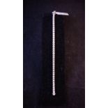 18CT. WHITE GOLD DIAMOND TENNIS BRACELET. . 4.5 CT.