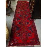 RED GROUND FULL PILE IRANIAN RUNNER WITH CROSS DESIGN 290 X 87CM