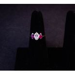 18K WHITE GOLD RING WITH MARQUIS DIAMOND AND MARQUIS RUBY. TOTAL DIAMOND .87CT, TOTAL RUBY .